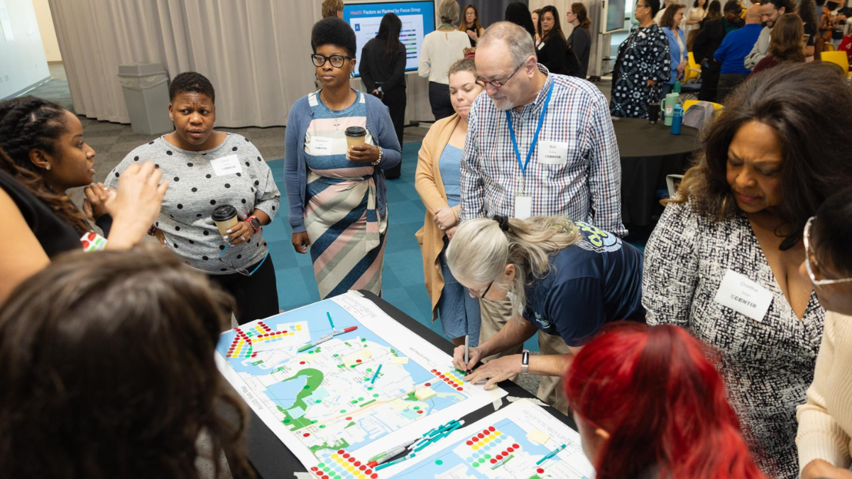 Residents exploring data from the South St. Pete Health Equity Profile at the Foundation's Data Walk