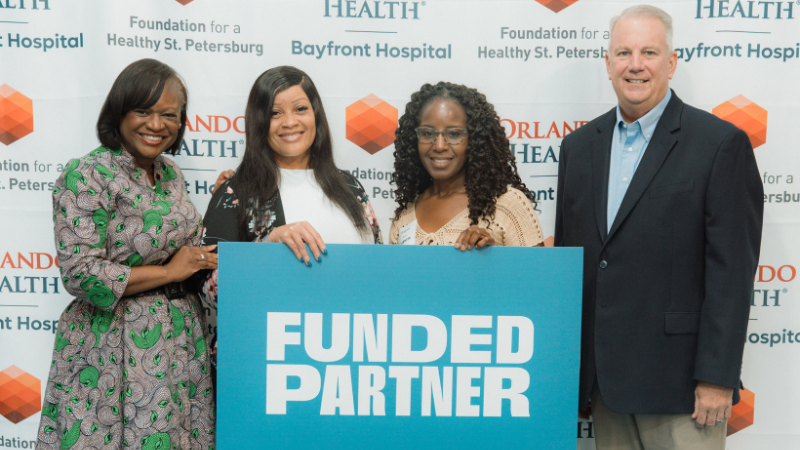 image of Kanika Tomalin, Marlo Jenkins and a co-worker, and John Moore