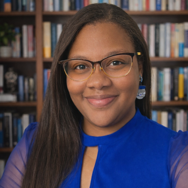 Alexus Taylor wearing a blue shirt