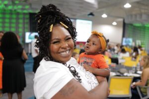 smiling mom and baby